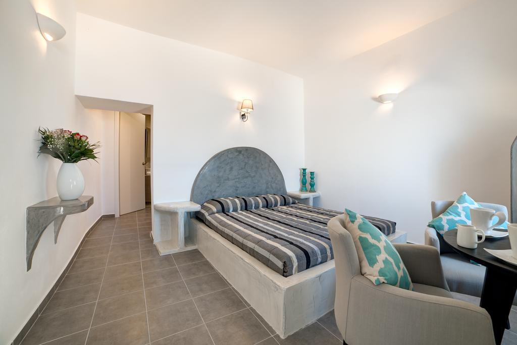 Remvi Suites Фиростефани Номер фото